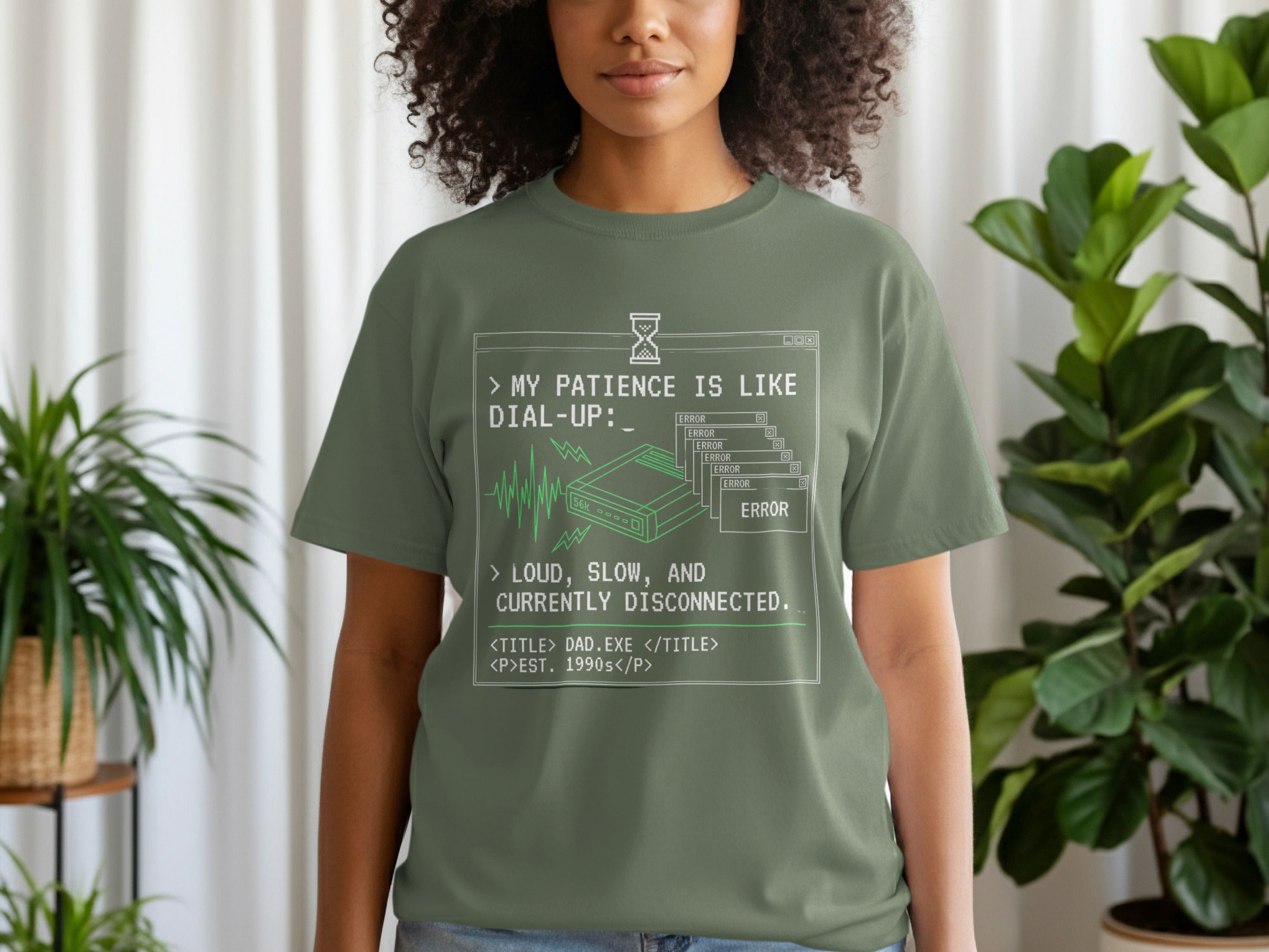 Green t-shirt with dial-up internet error message and "DAD.EXE EST. 1990s" text.