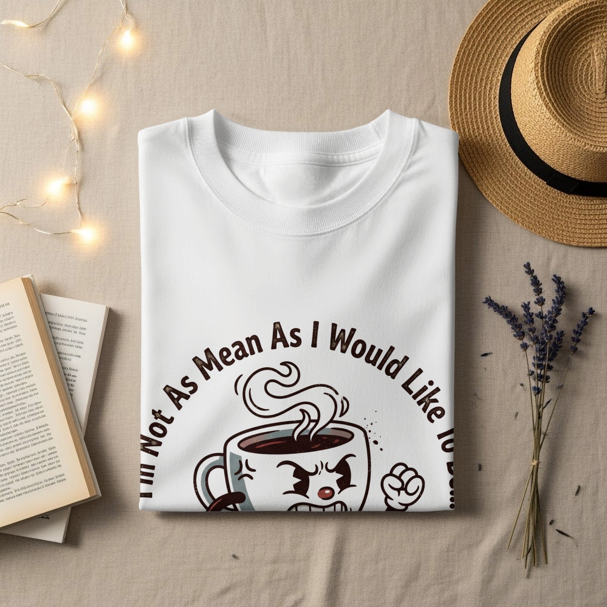 White t-shirt with a cartoon coffee mug and text "Not As Mean As I Would Like To Be".