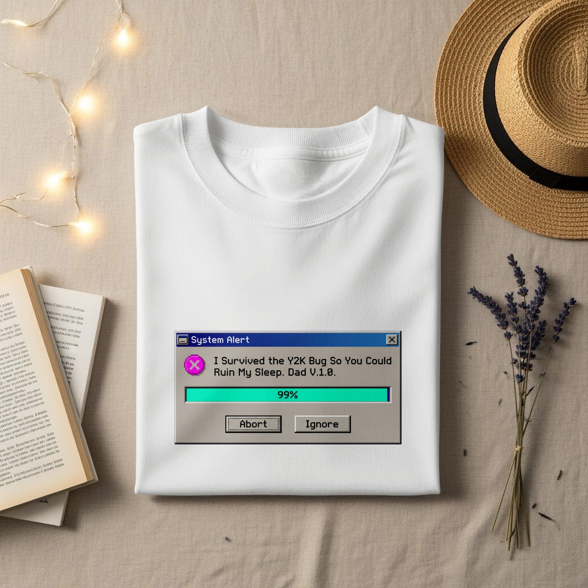 White t-shirt with a "System Alert" graphic about the Y2K bug.