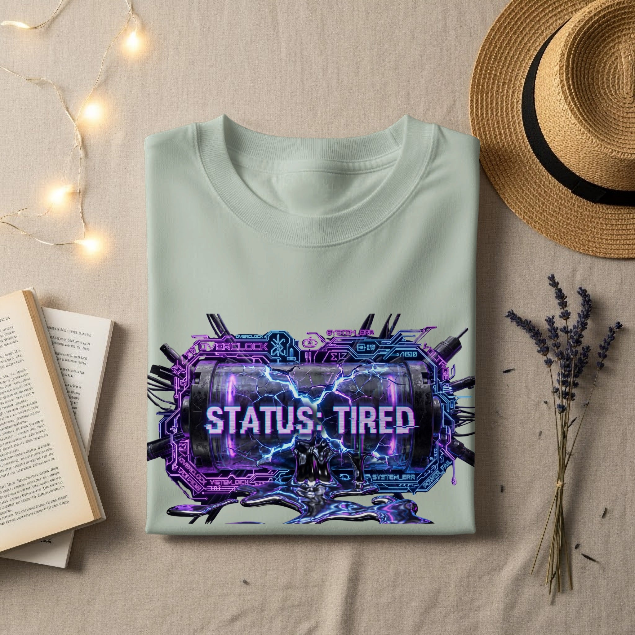 T-shirt with "STATUS: TIRED" text and futuristic circuit design.