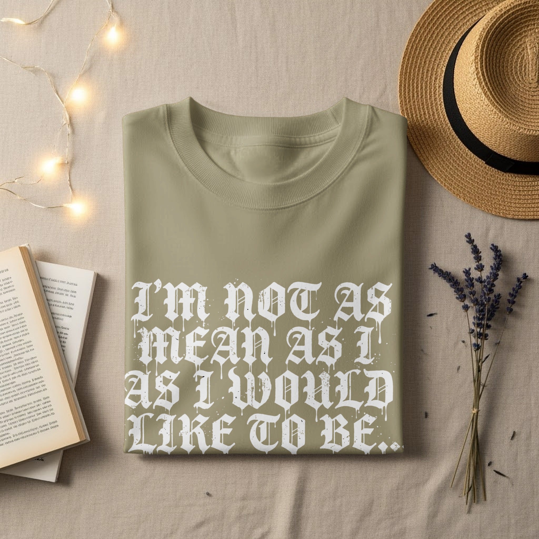 Olive green t-shirt with "I'm not as mean as I would like to be..." text.