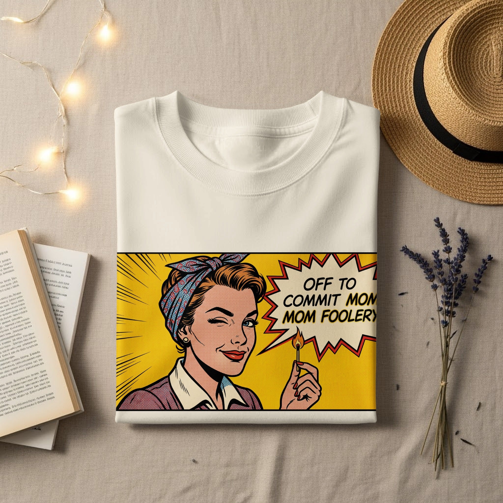T-shirt with a retro comic illustration of a woman holding a lit match, winking.
