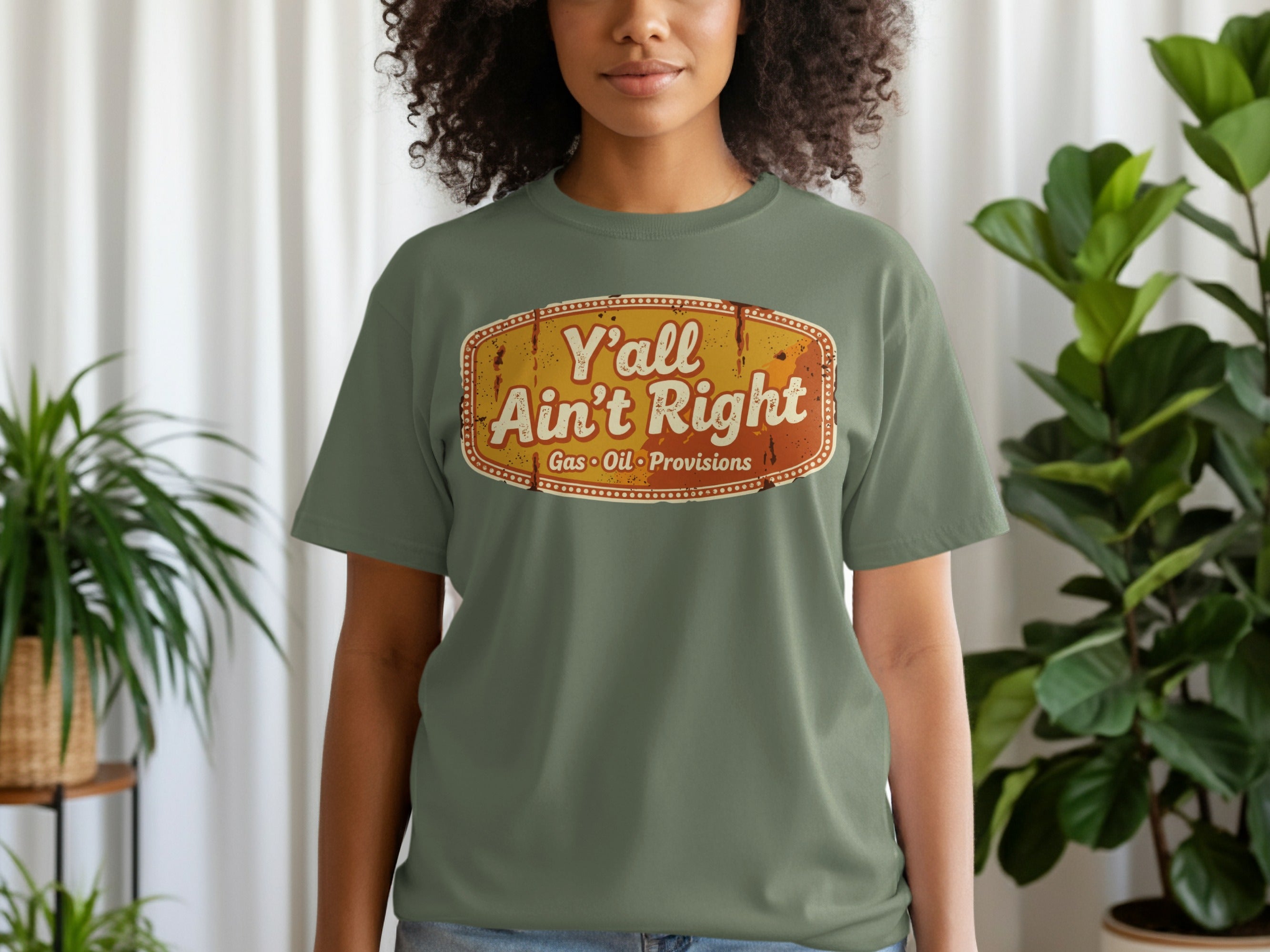 Green t-shirt with "Y'all Ain't Right" and "Gas, Oil, Provisions" text.