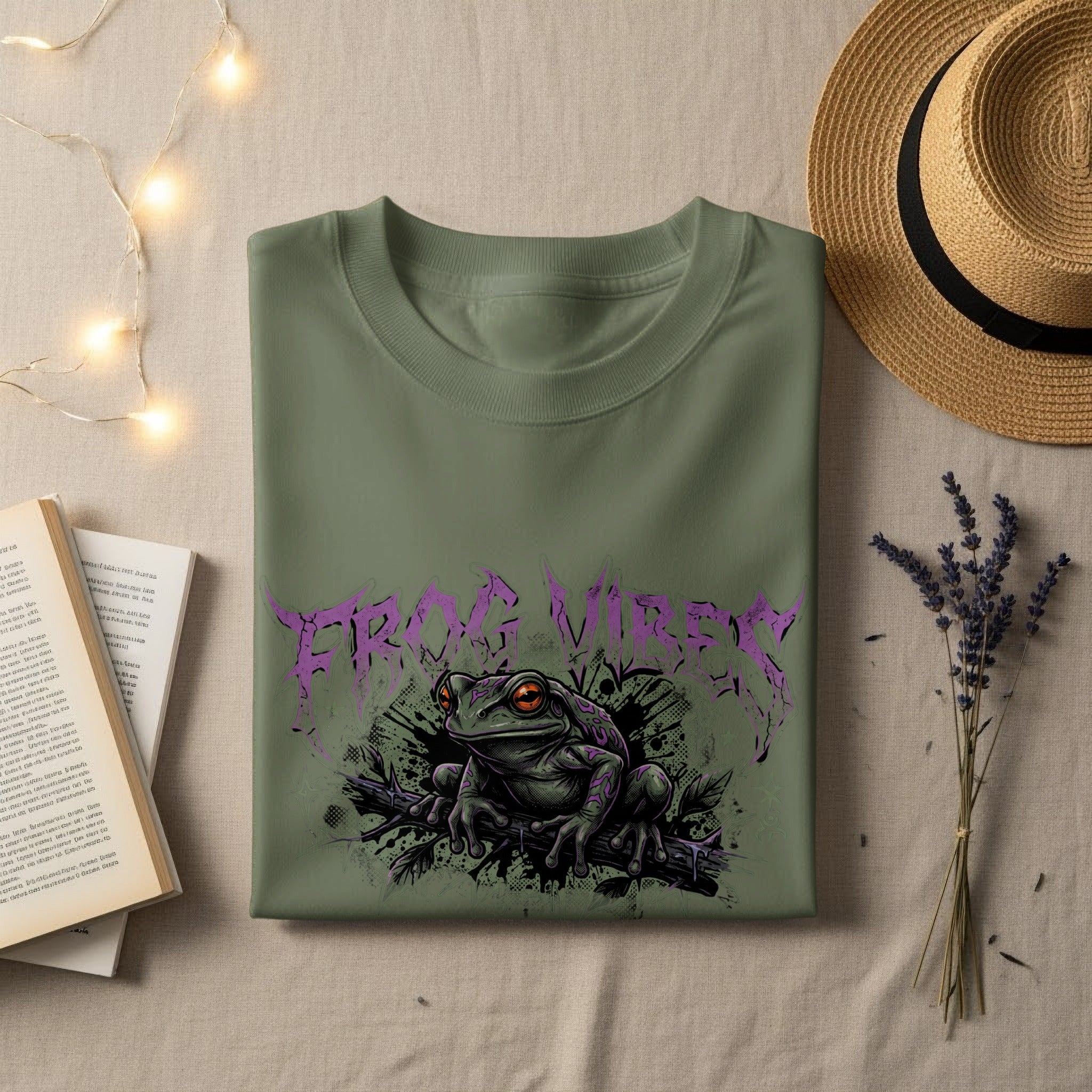 Olive green t-shirt with a purple frog graphic and "Frog Virgin" text.