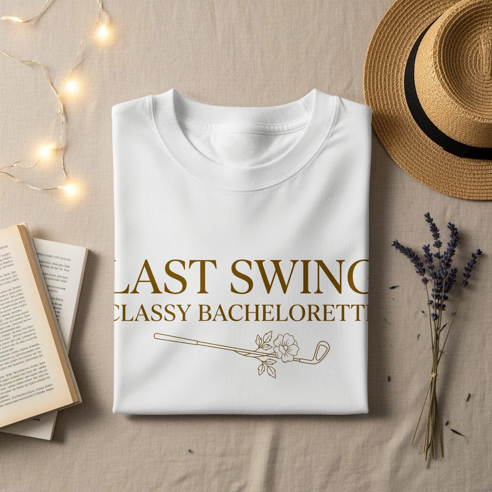 White t-shirt with "Last Swing Classy Bachelorette" and a golf club design.