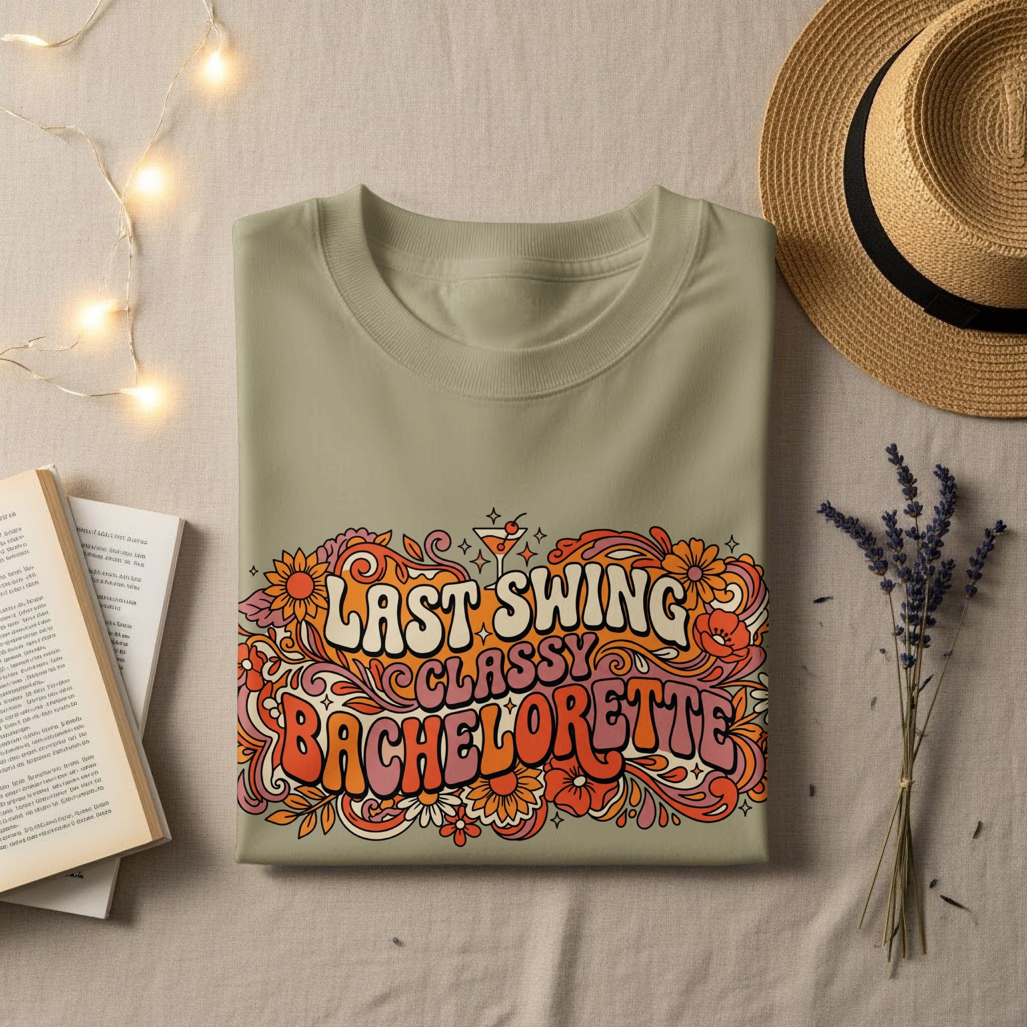 Olive green t-shirt with "Last Swing Classy Bachelorette" floral graphic.