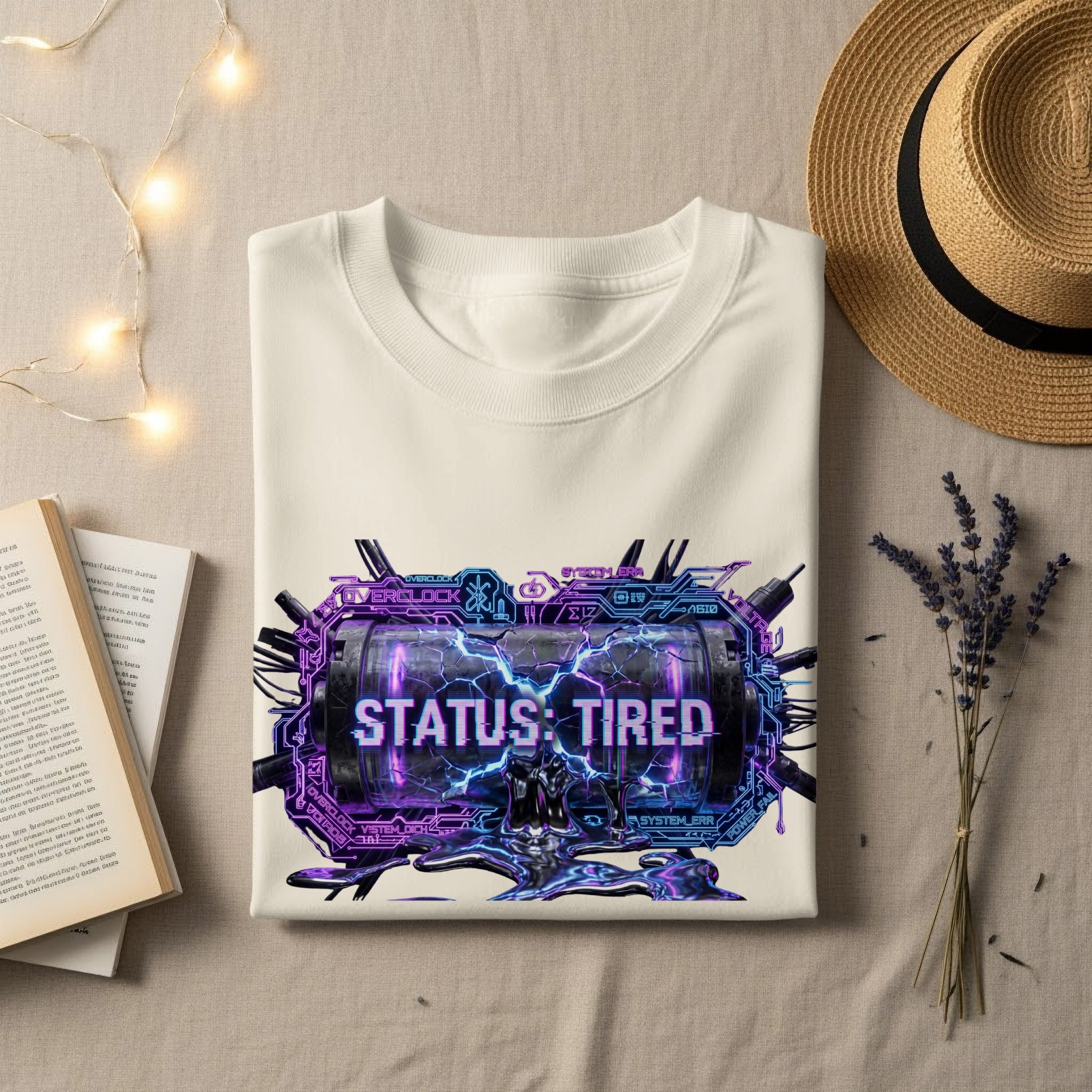 White t-shirt with "STATUS: TIRED" and circuit board graphic.