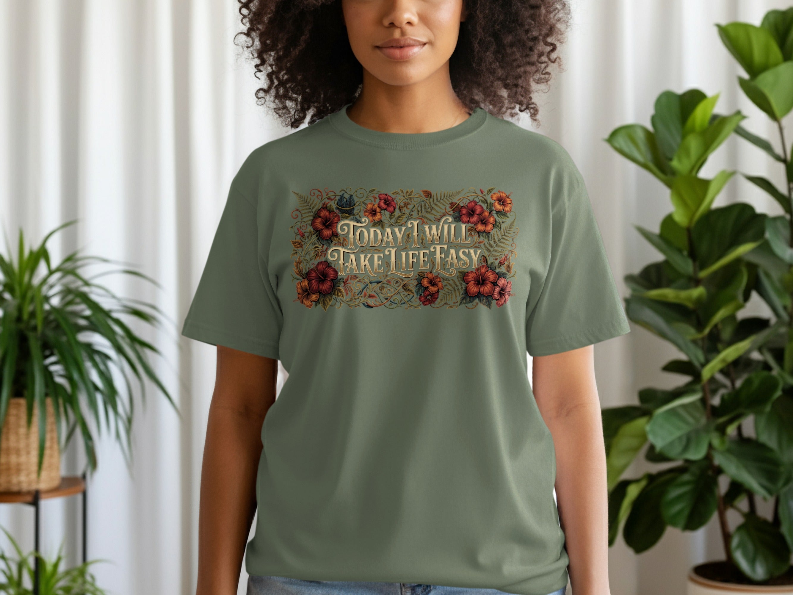Green t-shirt with "TODAY I WILL TAKE LIFE EASY" in decorative floral text.