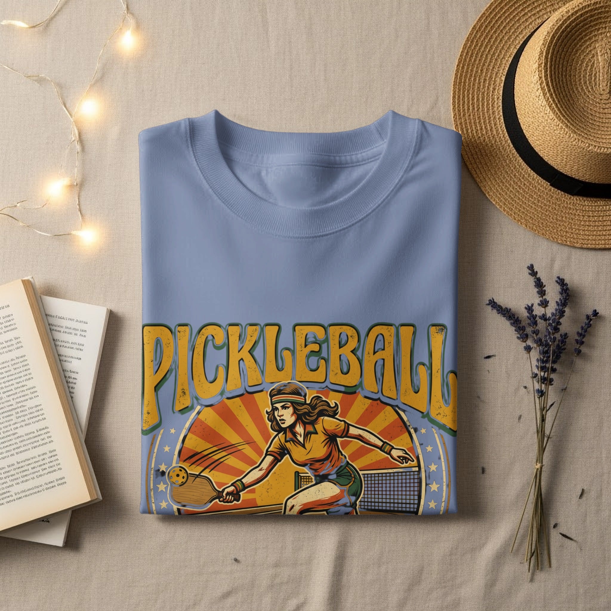 Light blue t-shirt with "PICKLEBALL" and a female player graphic.