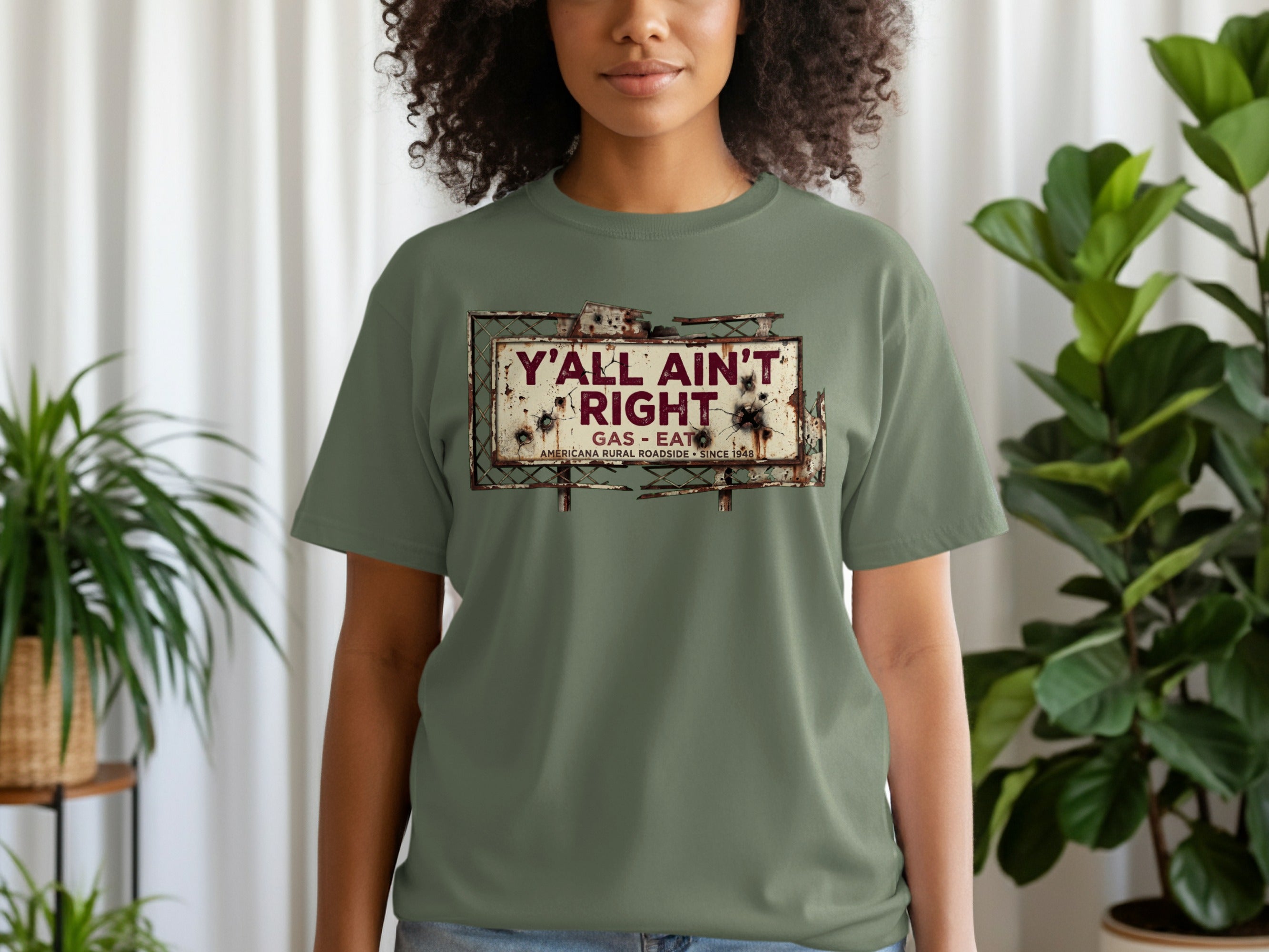 T-shirt with distressed sign reading "Y'all Ain't Right. Gas - Eat."