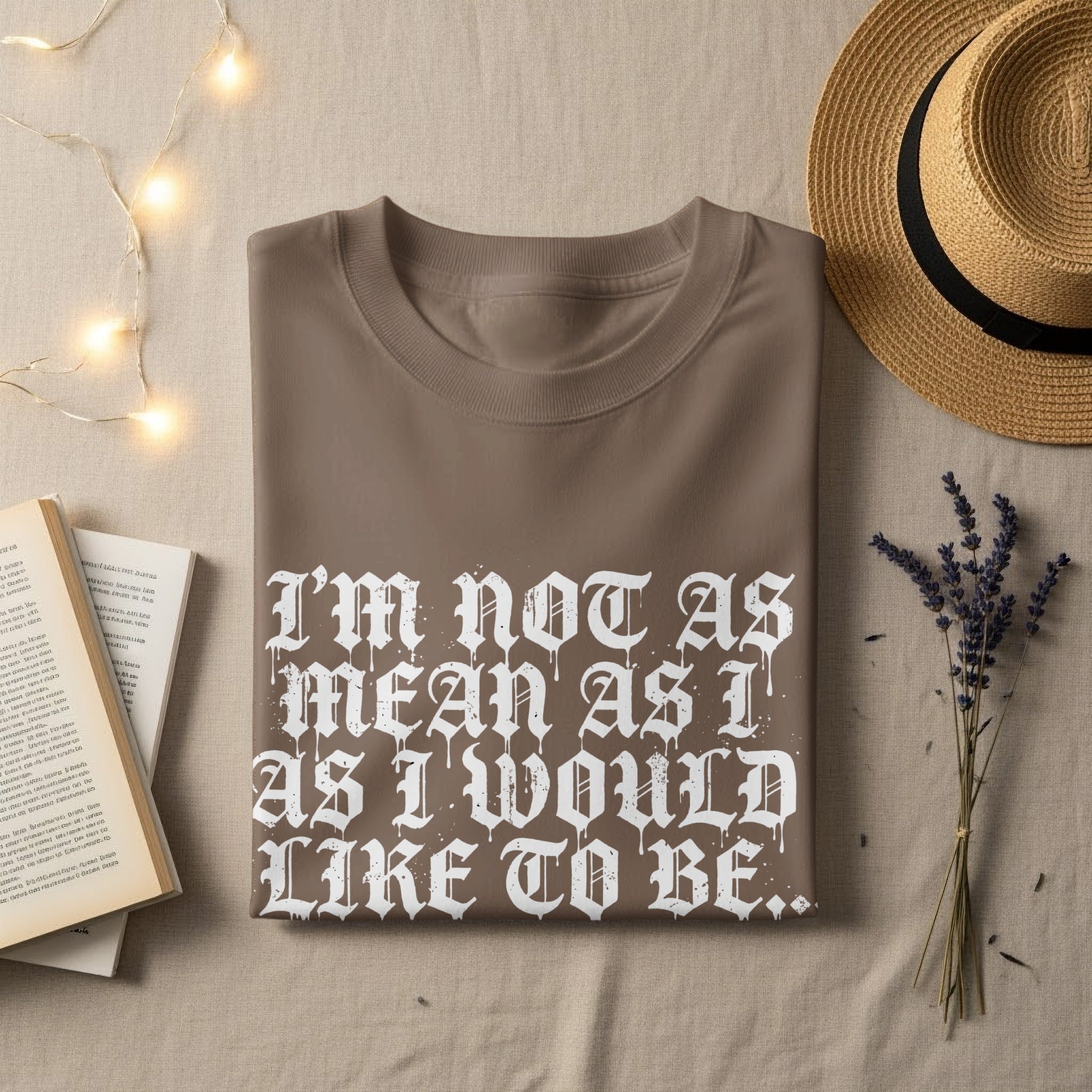 T-shirt with "I'm not as mean as I would like to be" printed on it.