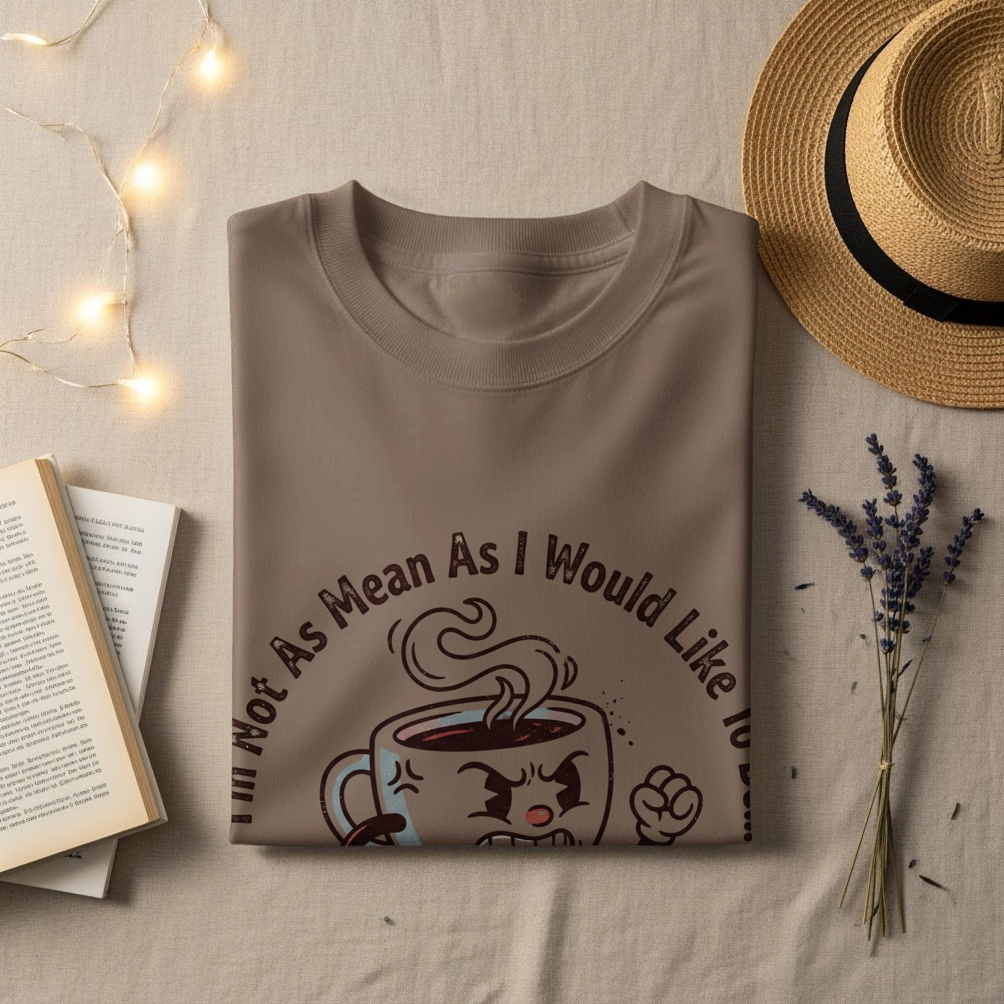 T-shirt with cartoon coffee mug saying "Not As Mean As I Would Like".