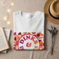 White t-shirt with "DINKS & S" and geometric patterns.