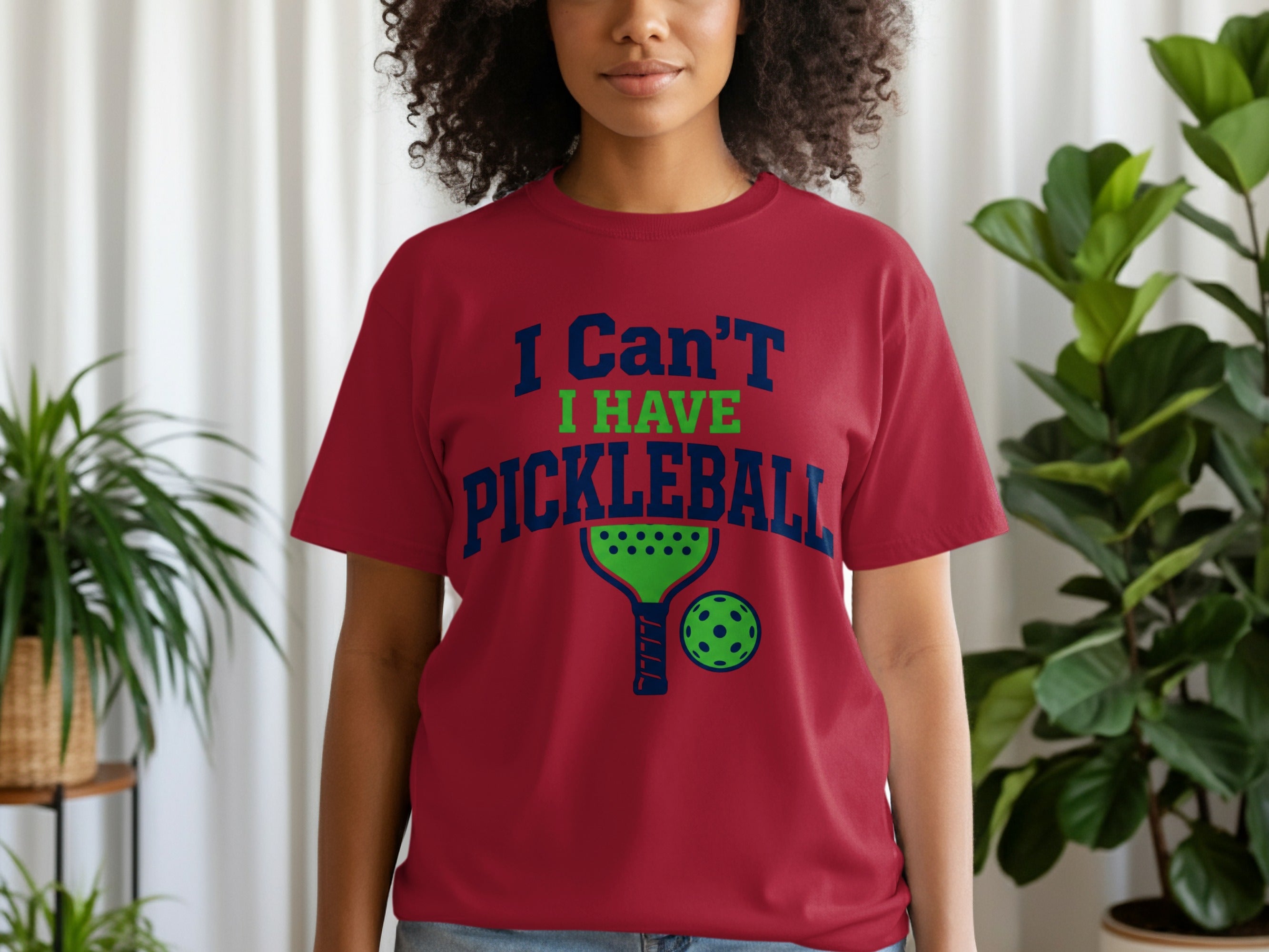 Maroon t-shirt with "I Can't Pickleball" graphic and pickleball paddle and ball.