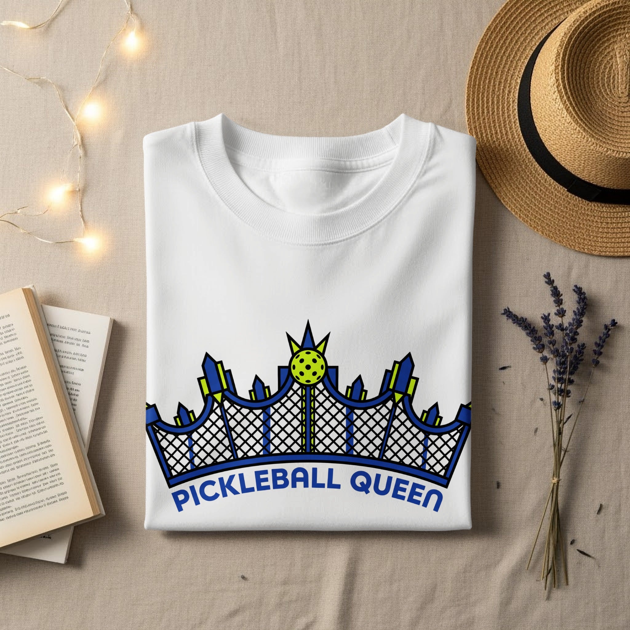 White t-shirt with "PICKLEBALL QUEEN" text and crown graphic.