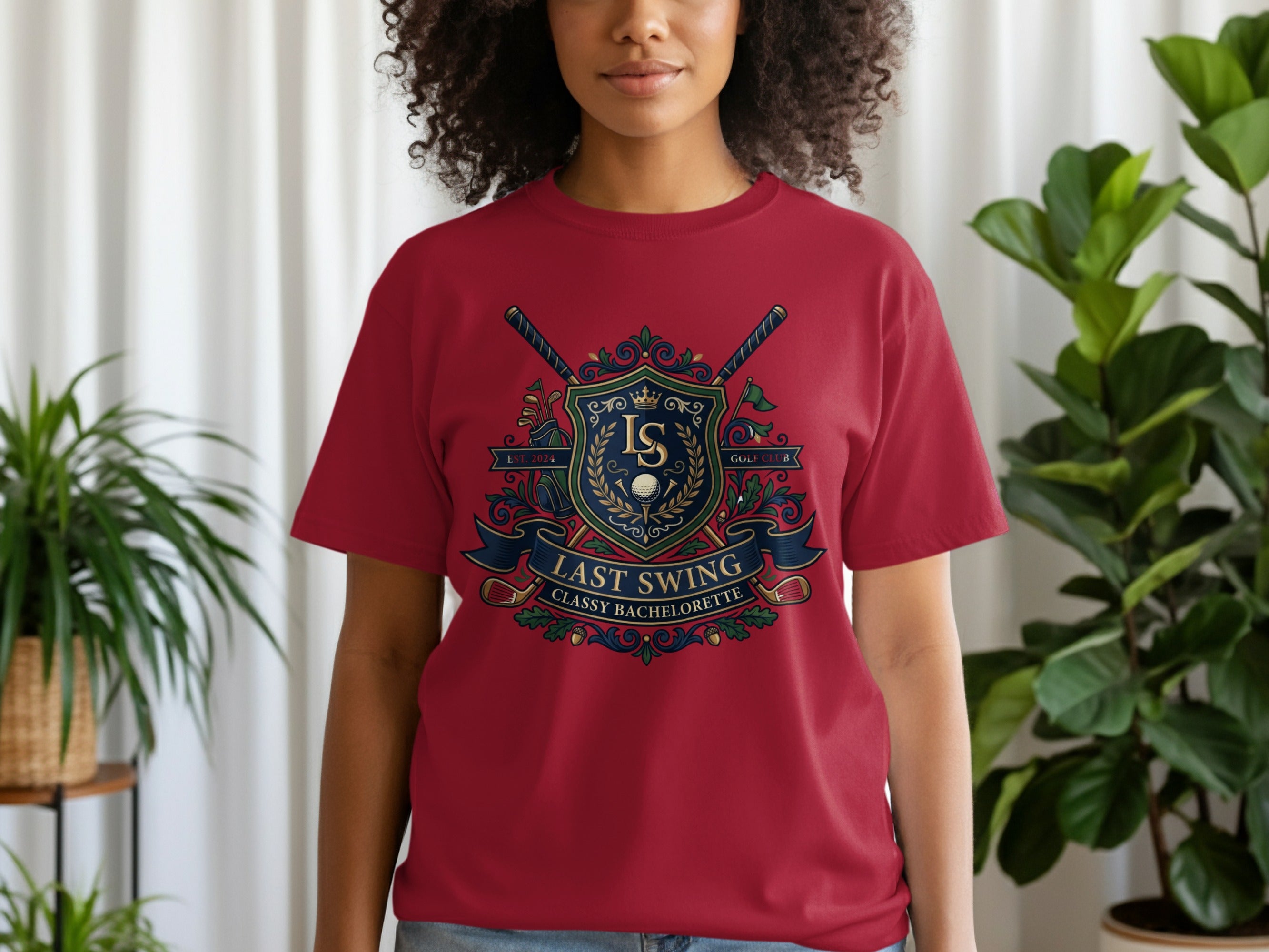 Maroon t-shirt with a "Last Swing" golf crest design.