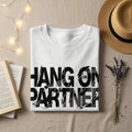 White sweatshirt with "HANG ON PARTNER" in bold, distressed black lettering.