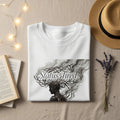 White t-shirt with "Status: Tired" graphic featuring a woman's silhouette and tangled hair.