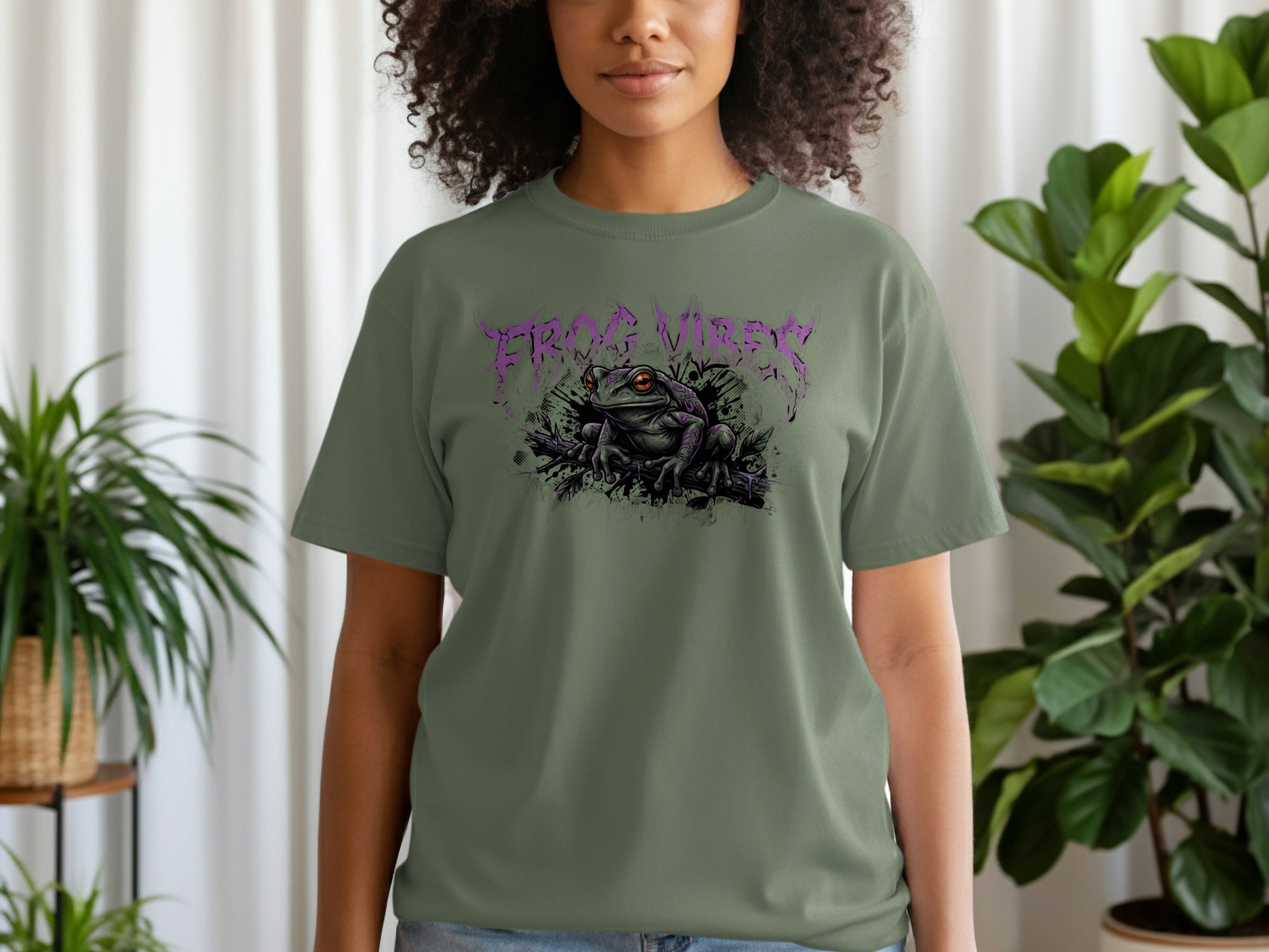 Green t-shirt with a mystical frog and "Frog Vibes" text.
