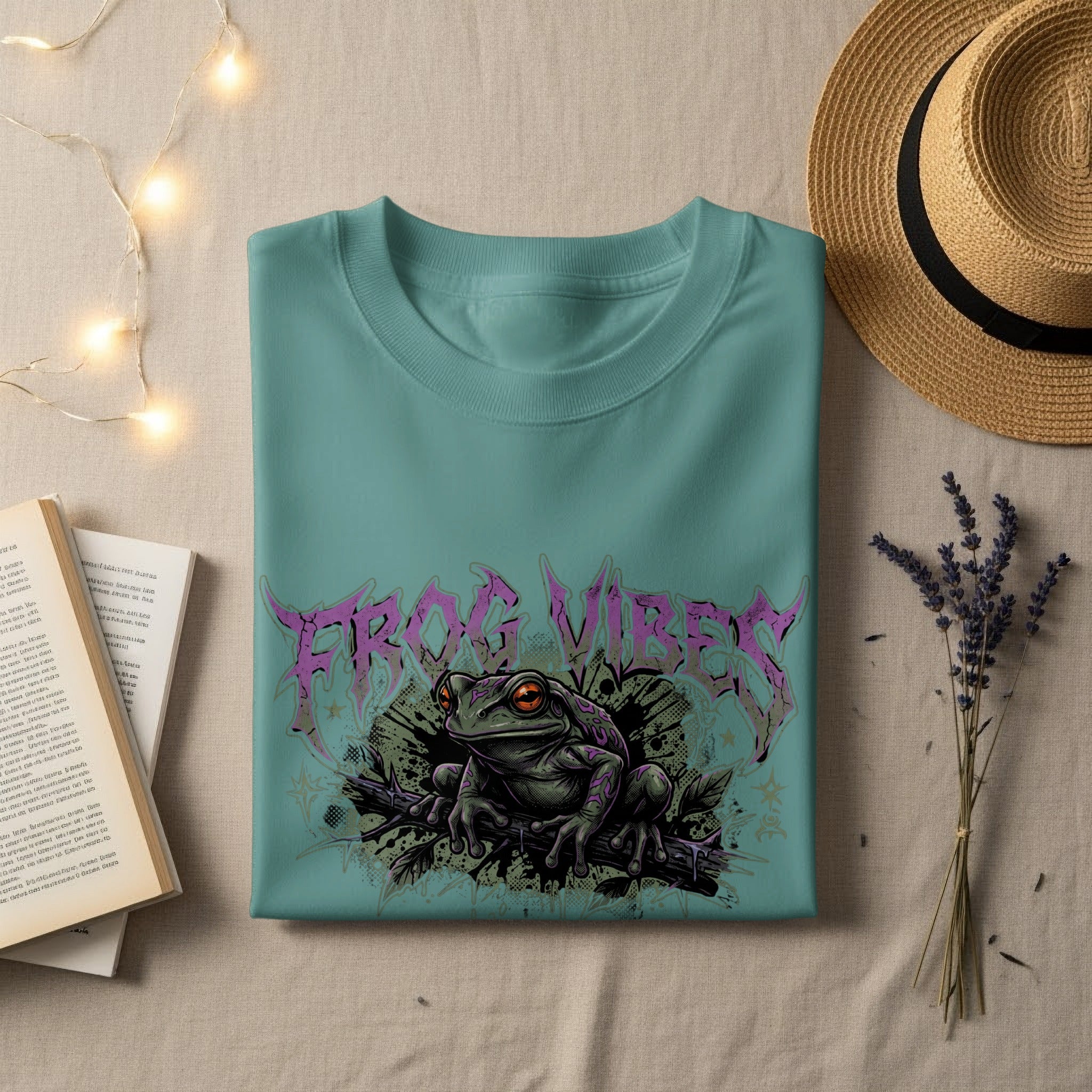 Green t-shirt with "Frog Vibes" graphic featuring a frog on a branch.