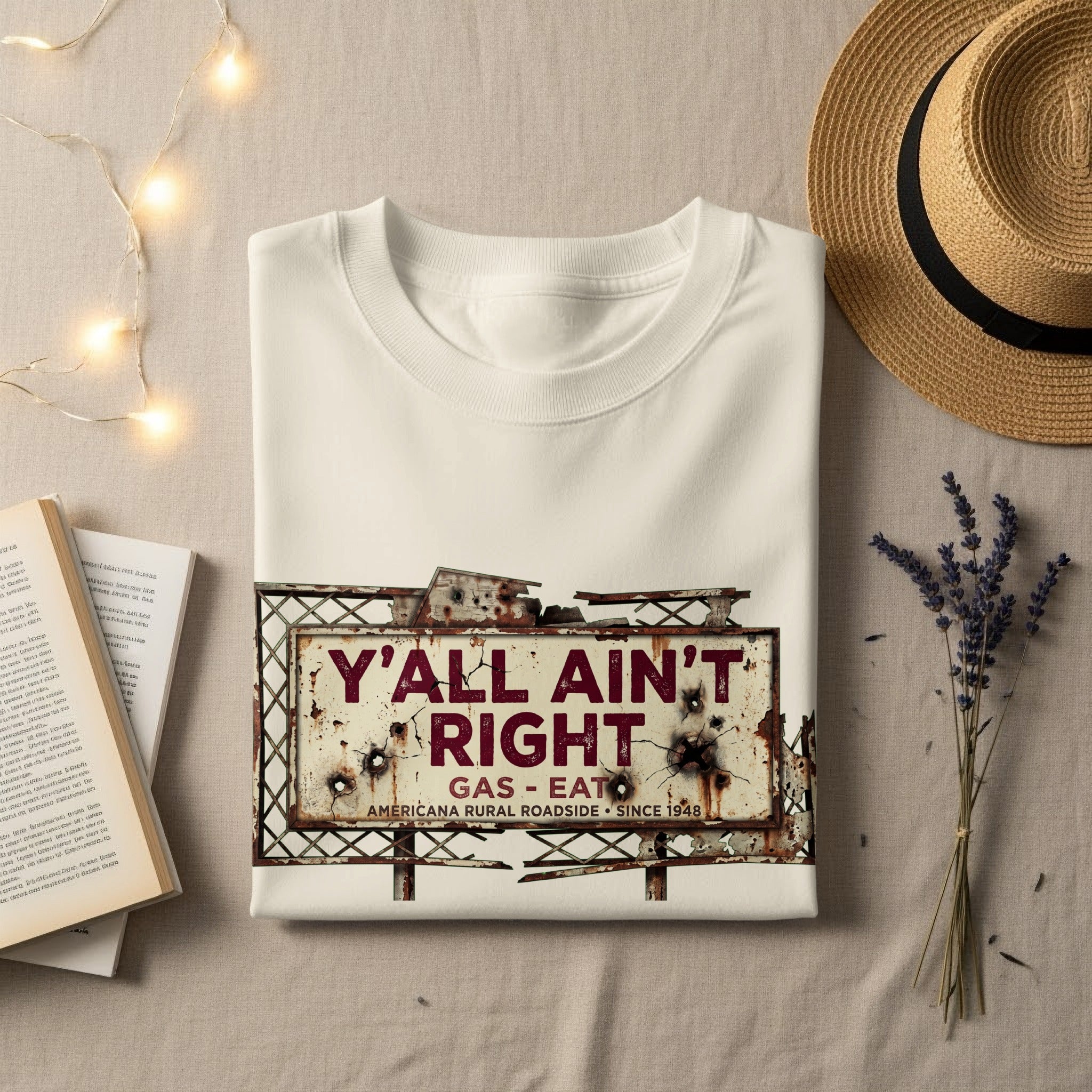 White sweatshirt with distressed "Y'all Ain't Right" gas station sign graphic.