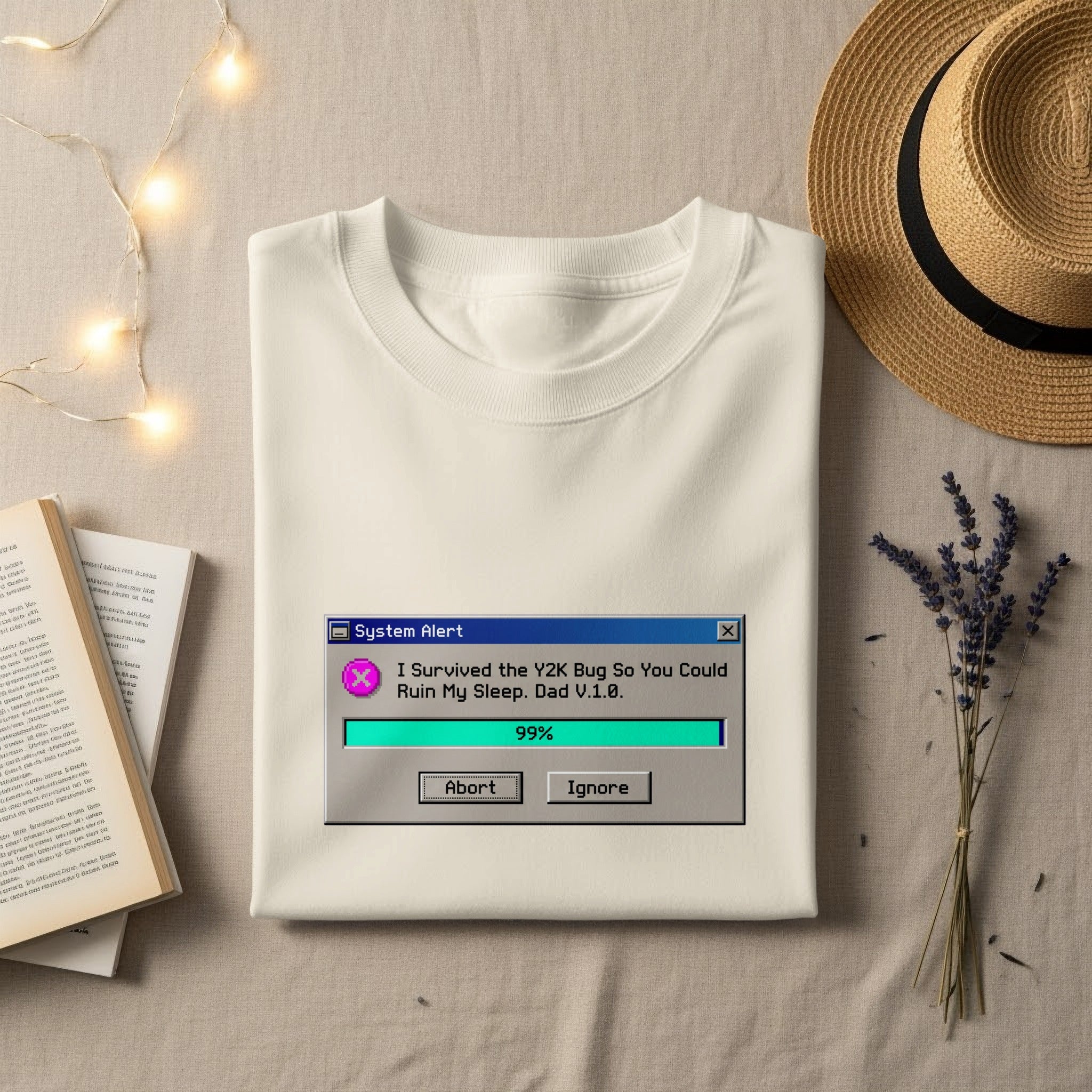 T-shirt with a "System Alert" pop-up about the Y2K bug.