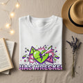 White t-shirt with "BIAS WRECKEL" in bold purple letters and green heart graphic.