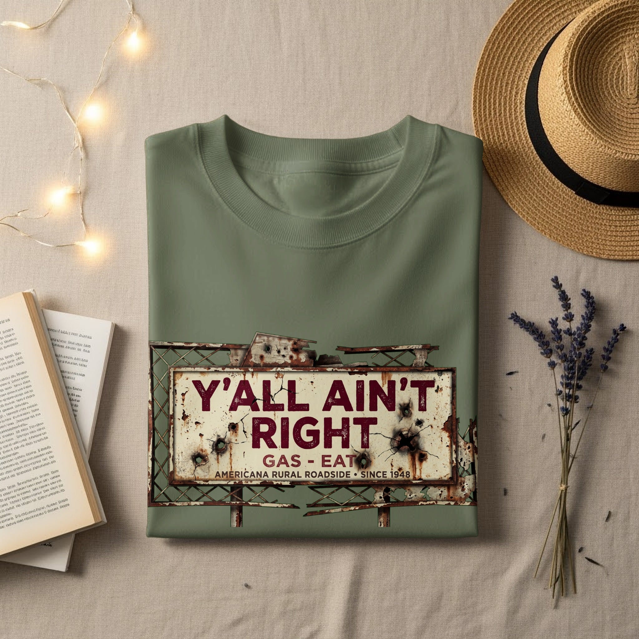 Olive green t-shirt with a distressed "Y'all Ain't Right" gas eat sign graphic.