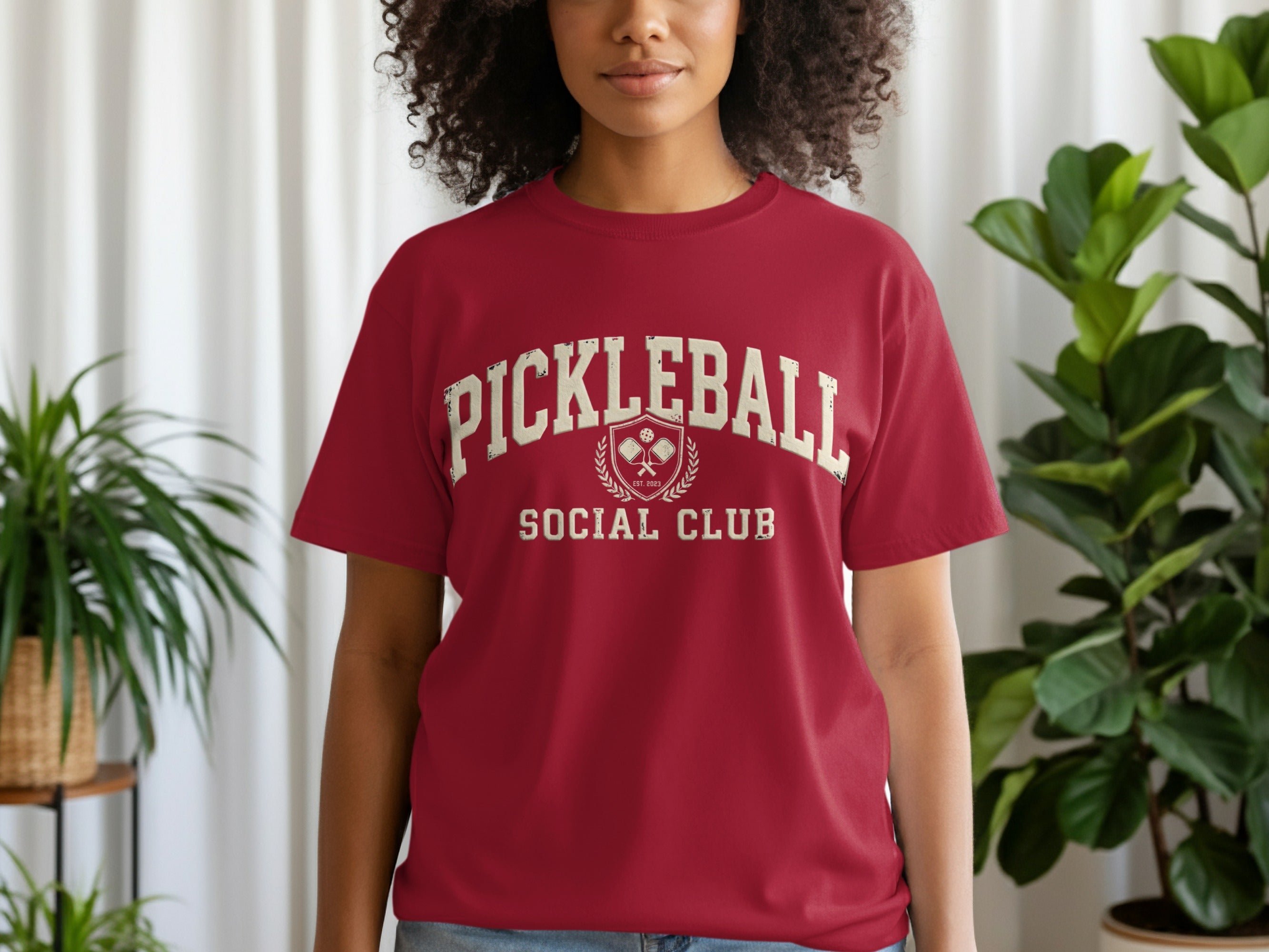 Maroon t-shirt with "Pickleball Social Club" text in white distressed lettering.