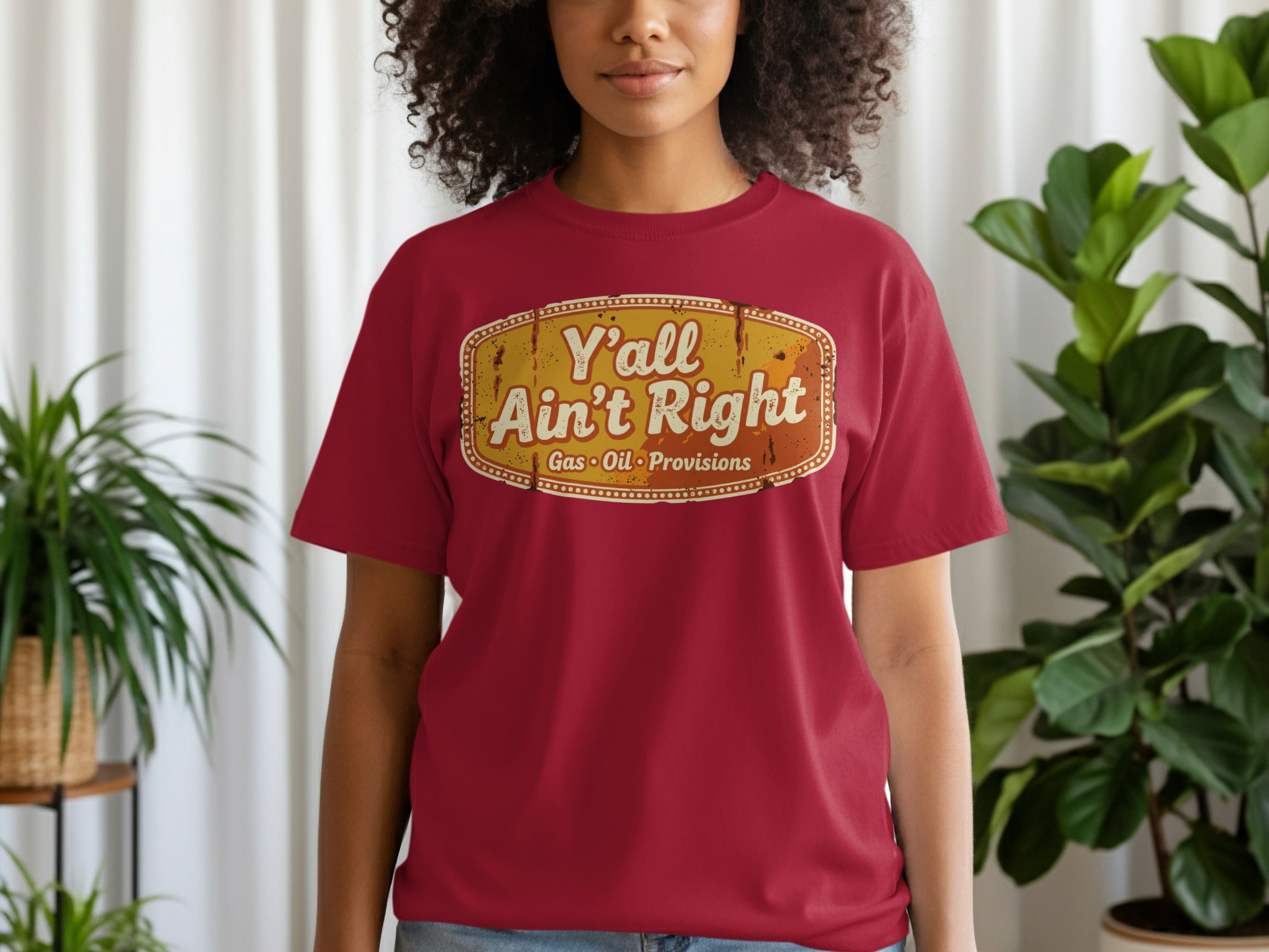 Red t-shirt with distressed oval yellow text: "Y'all Ain't Right Gas Oil Provisions".