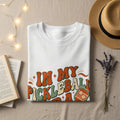 White t-shirt with "IN MY PICKLEBALL" text and a pickleball paddle.