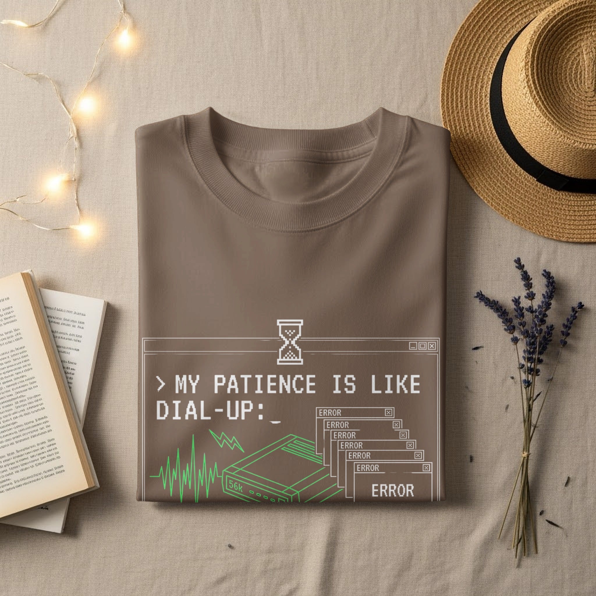 Brown t-shirt with a graphic featuring a dial-up modem and "My patience is like dial-up" text.
