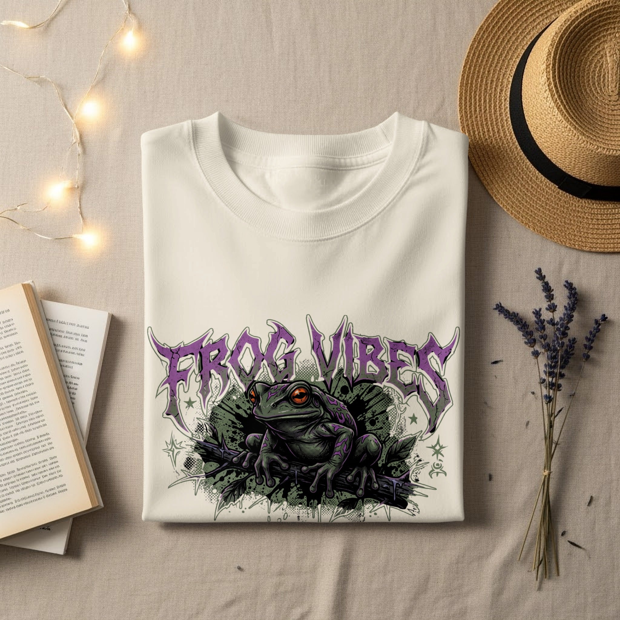 White t-shirt with "FROG VIBES" graphic featuring a frog on a branch.