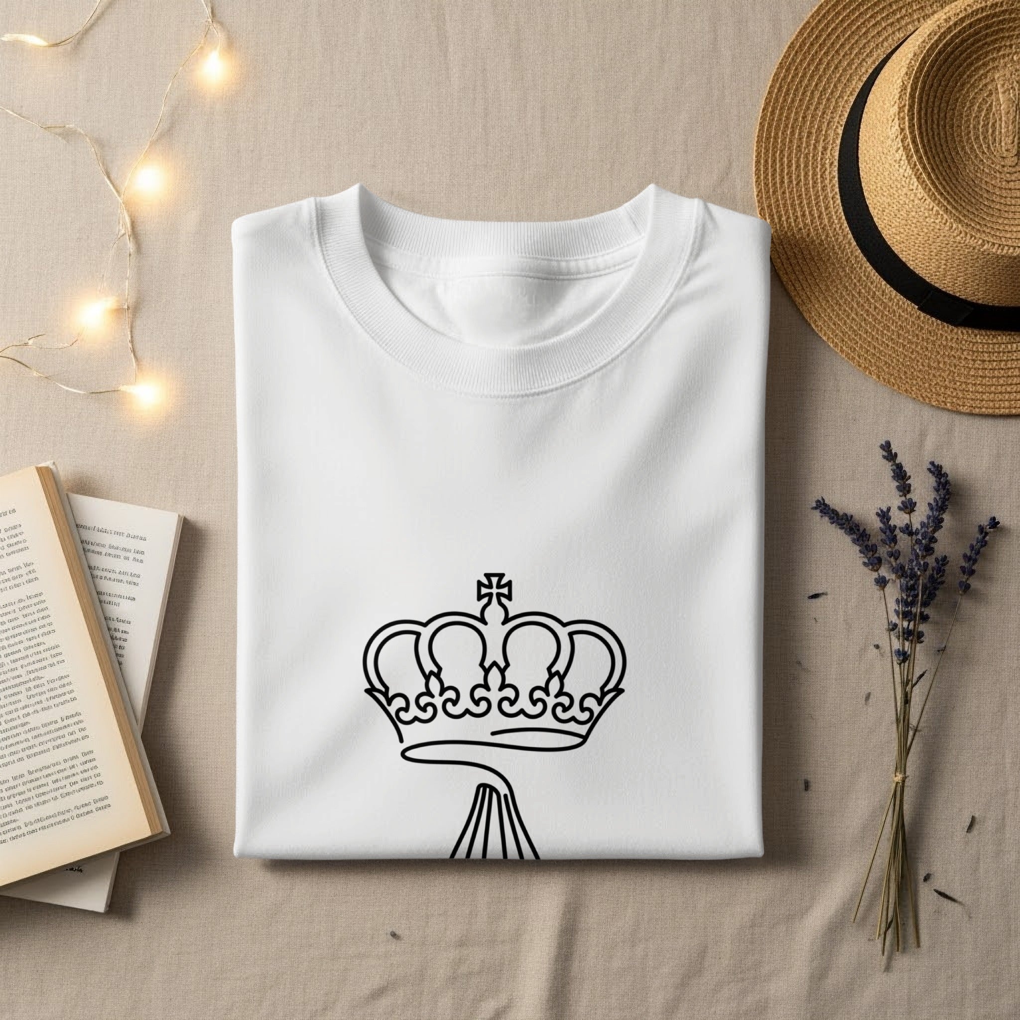 White t-shirt with a black line drawing of a crown.