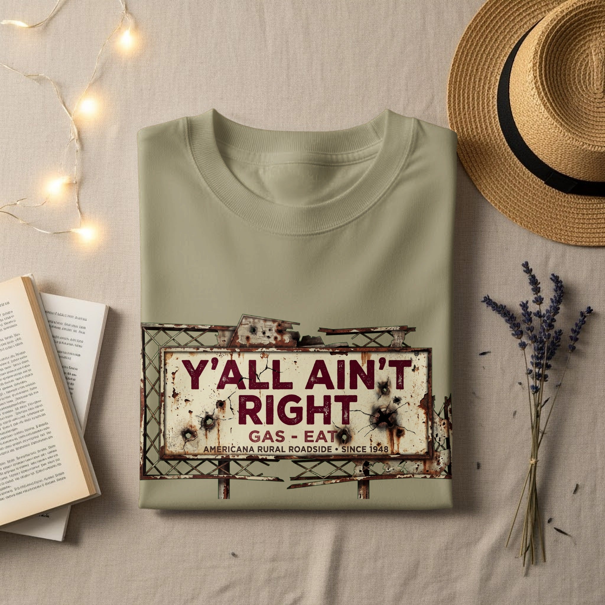 T-shirt with distressed "Y'all Ain't Right" gas station sign graphic.