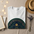 White t-shirt with green circular logo featuring pickleball paddles and "IN MY PICKLEBALL ERA."