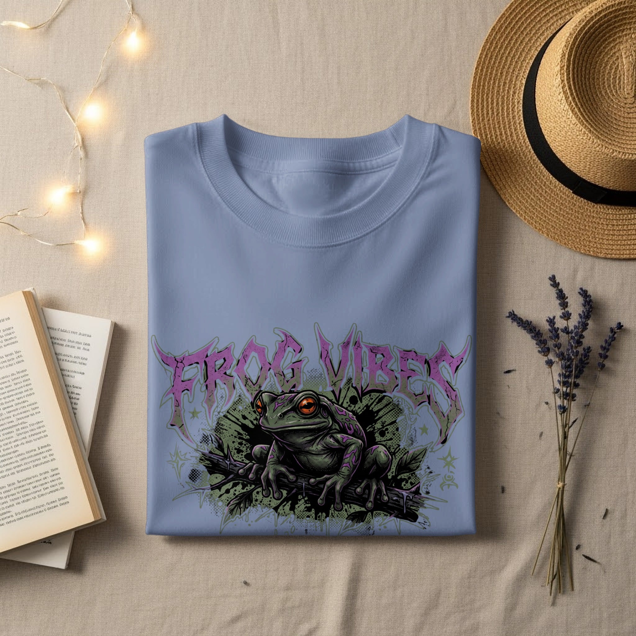 Light blue t-shirt with "Frog Vibes" graphic on a branch.