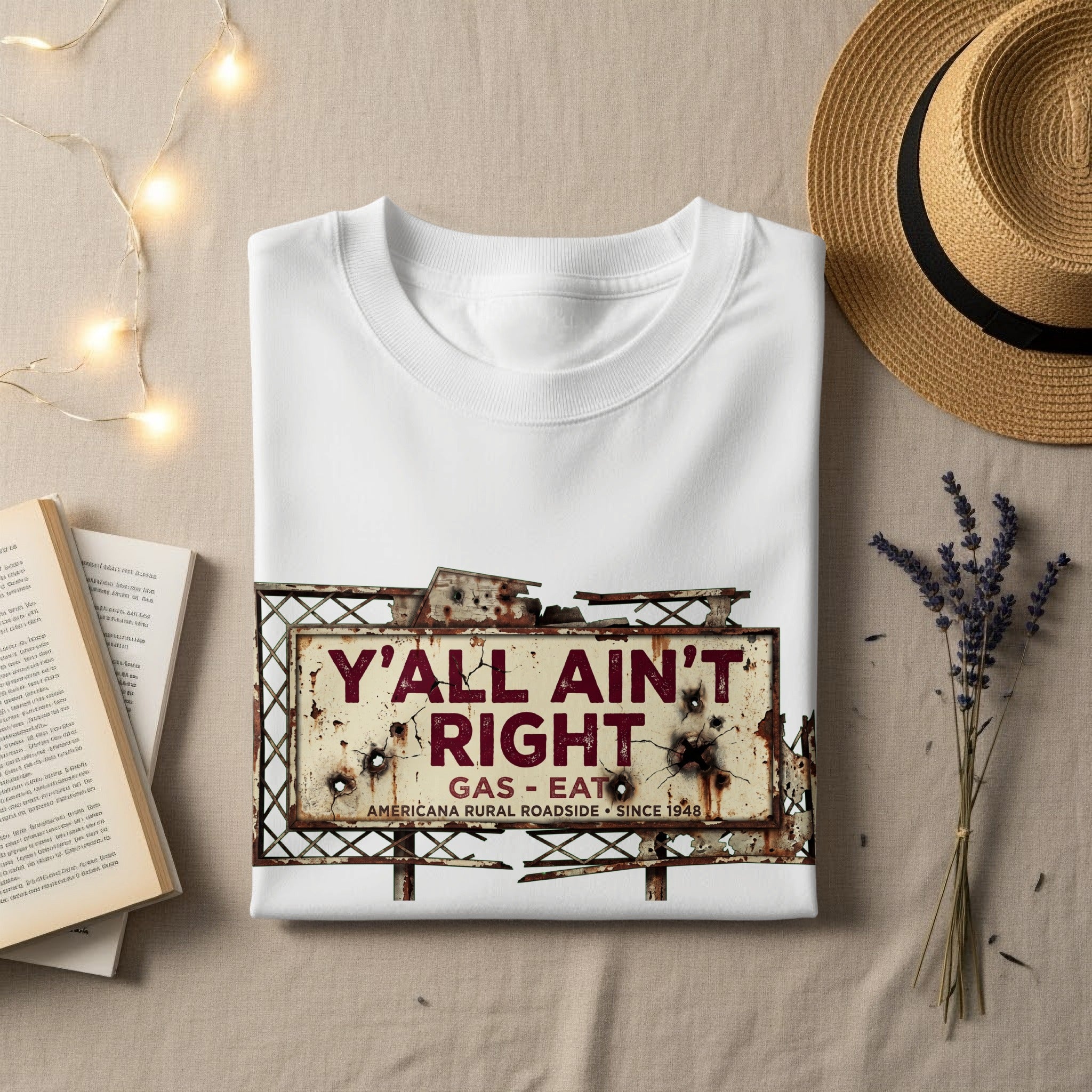 White sweatshirt with distressed "Y'all Ain't Right" gas station sign graphic.