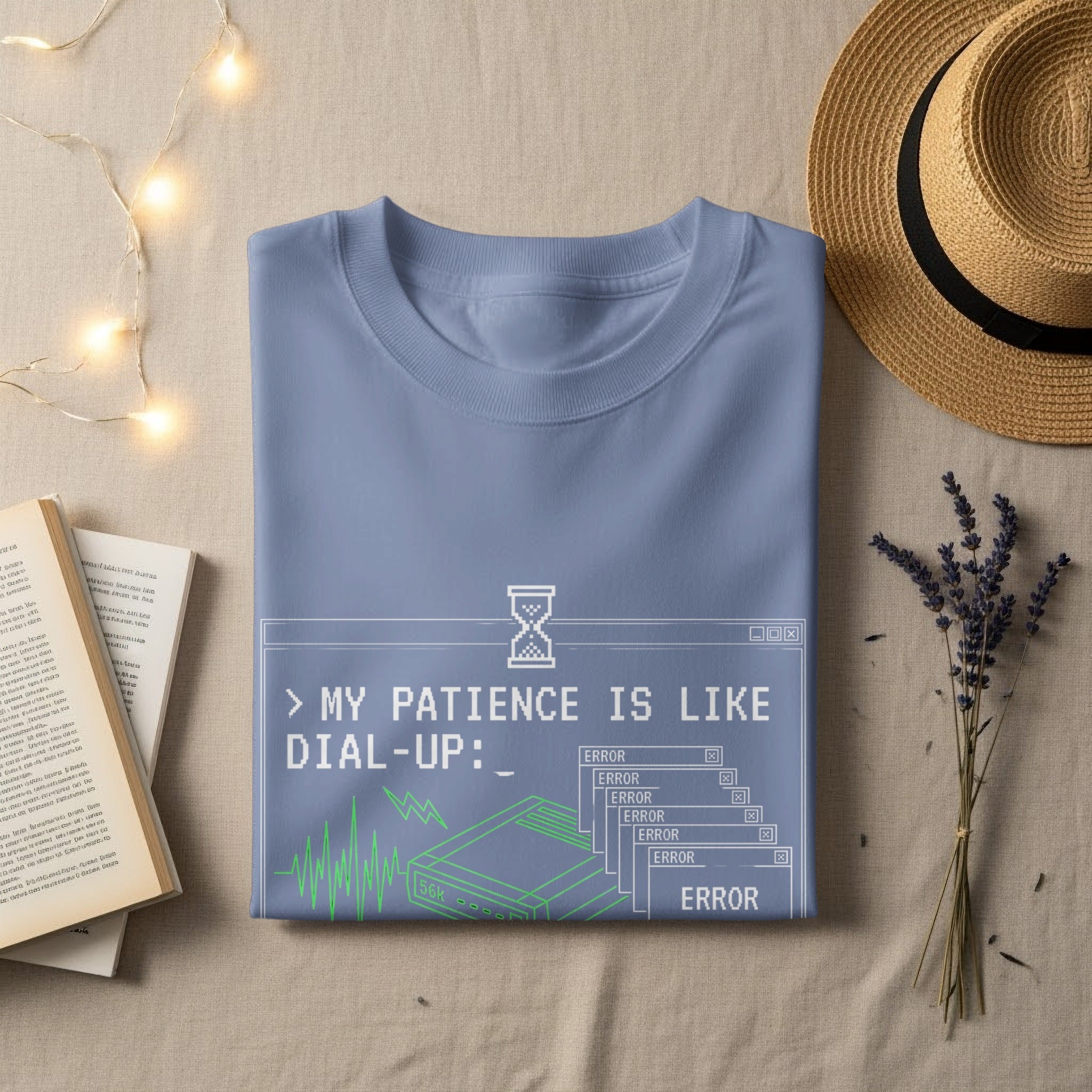 Light blue t-shirt with "My patience is like dial-up" and error messages.
