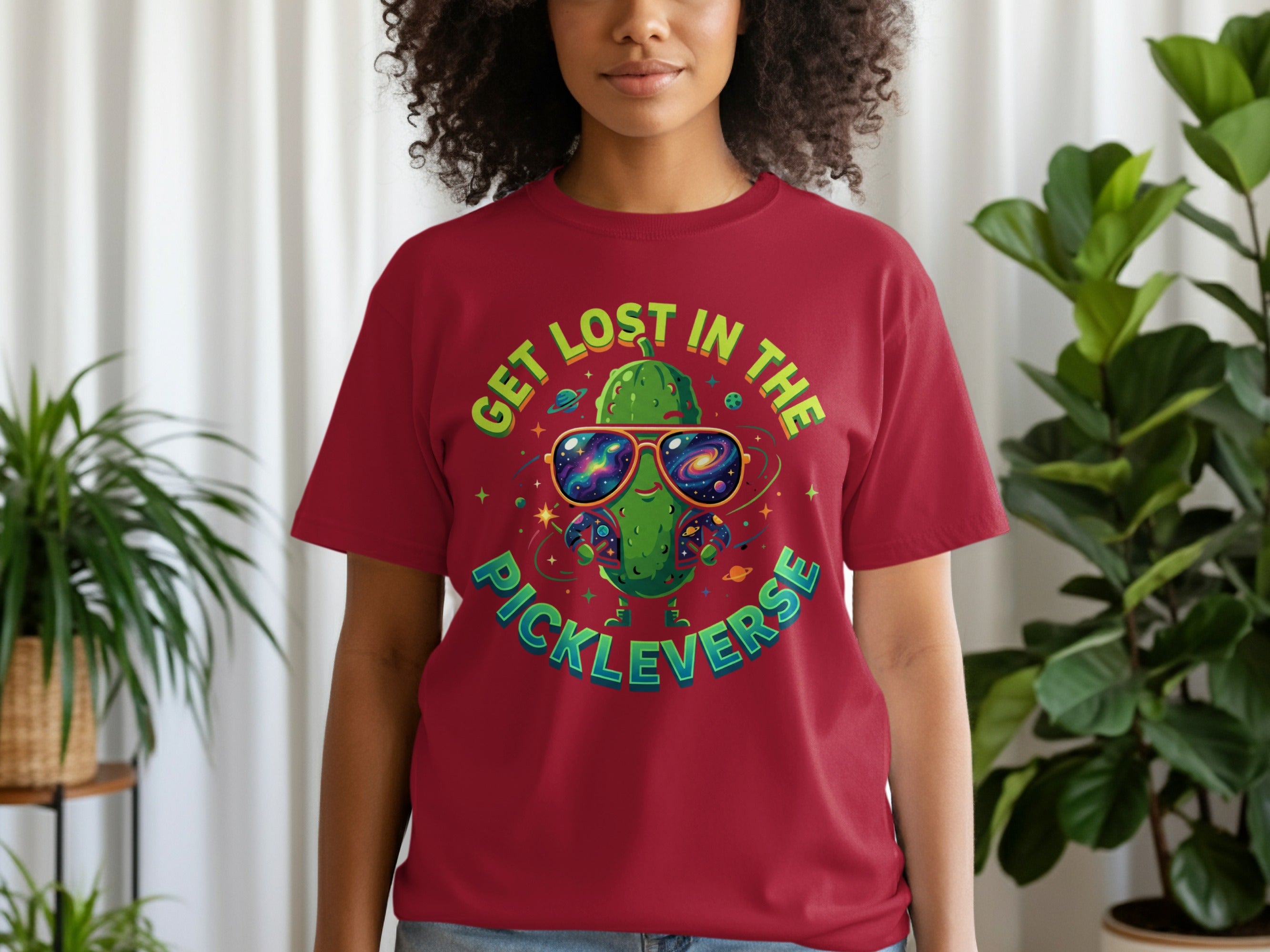 Maroon t-shirt with a pickle wearing sunglasses and text "GET LOST IN THE PICKLEVERSE".