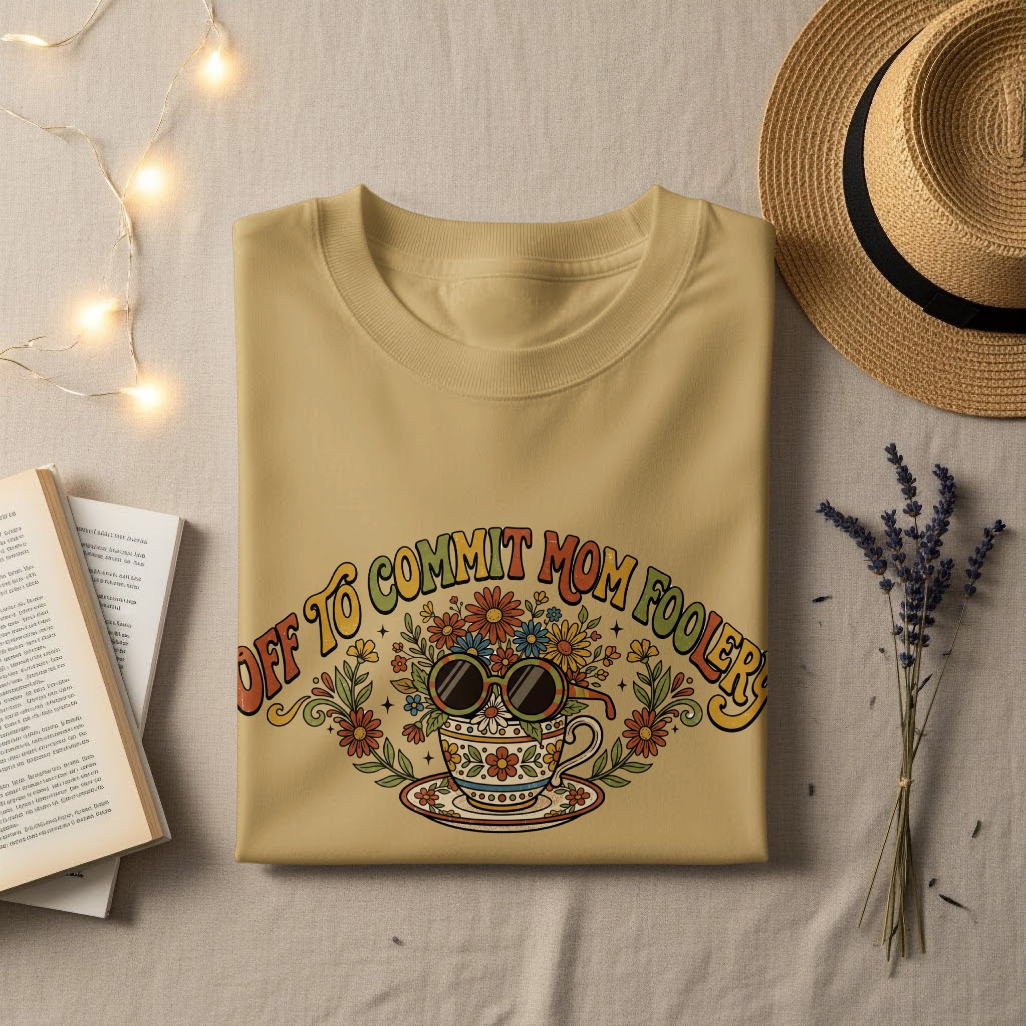 T-shirt with "OFF TO COMMIT MOM FOOLER" text and floral teacup graphic.