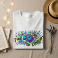 White t-shirt with "I HAVE THE CONCEPT" and a colorful brain graphic.