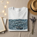 White sweatshirt with "Expect a Few Inches" and "Storm Tracker" graphic.