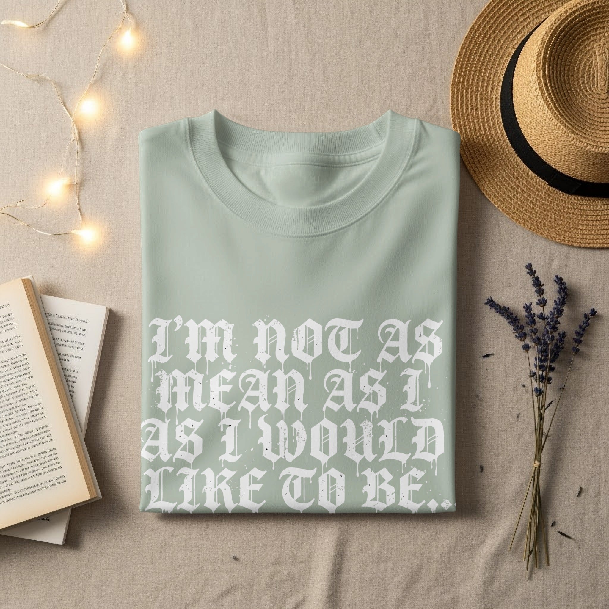 Light green t-shirt with "I'm not as mean as I would like to be" text.