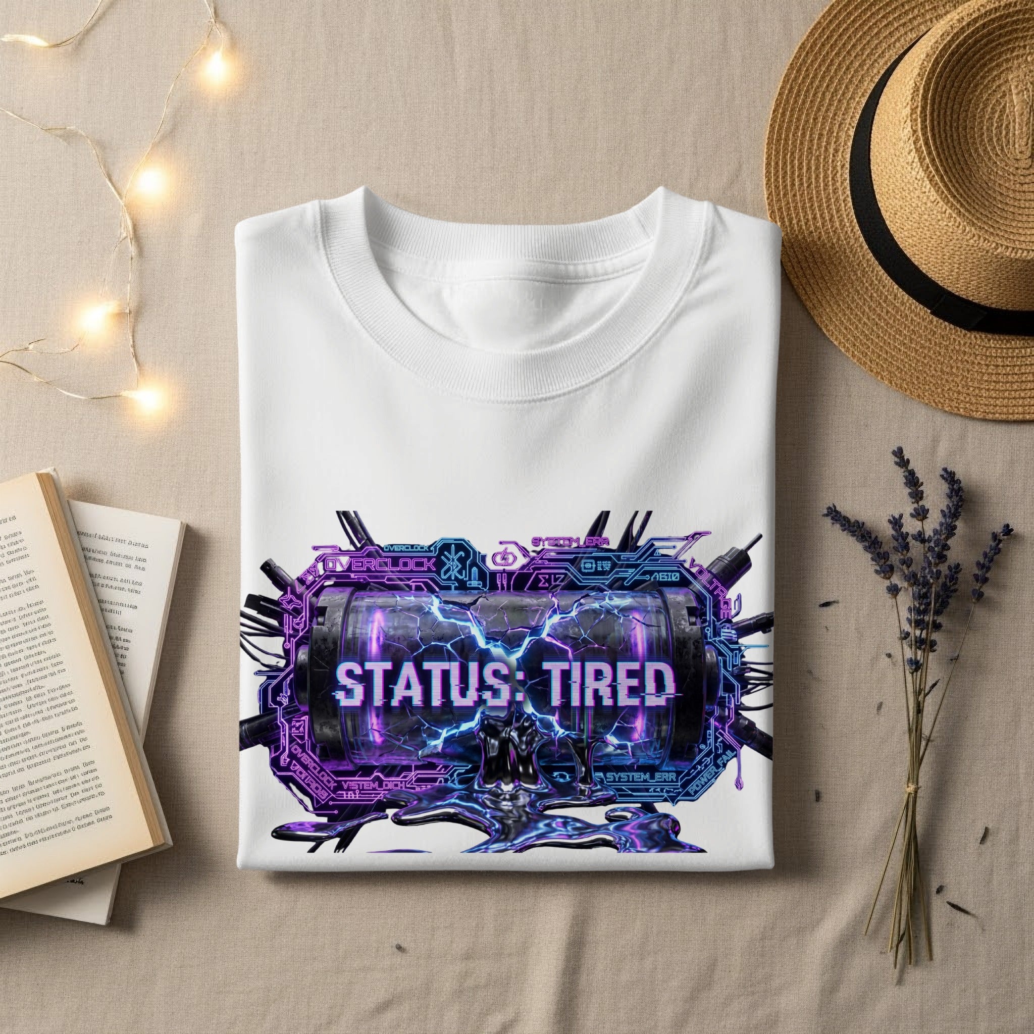 White t-shirt with "STATUS: TIRED" graphic featuring a glitchy, futuristic frame.