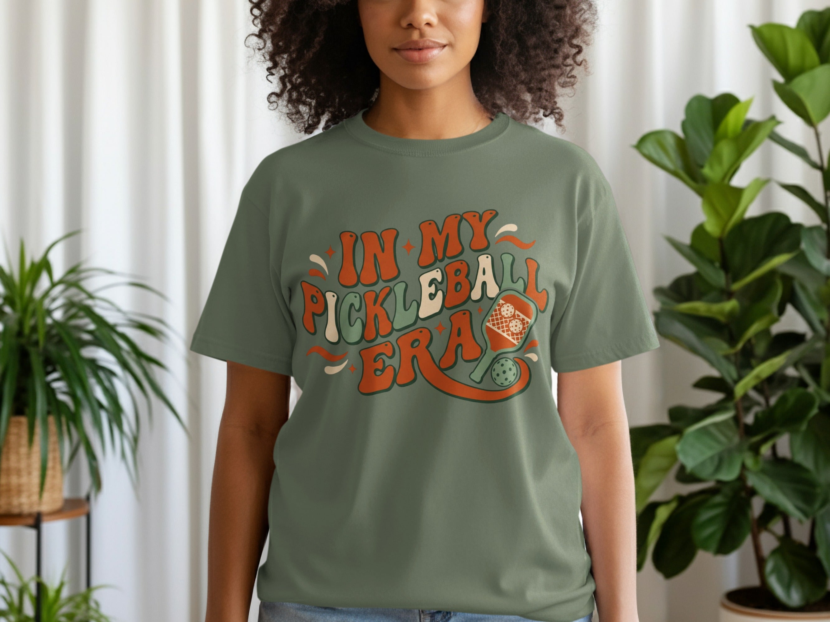 Green t-shirt with "IN MY PICKLEBALL" text and paddle graphic.