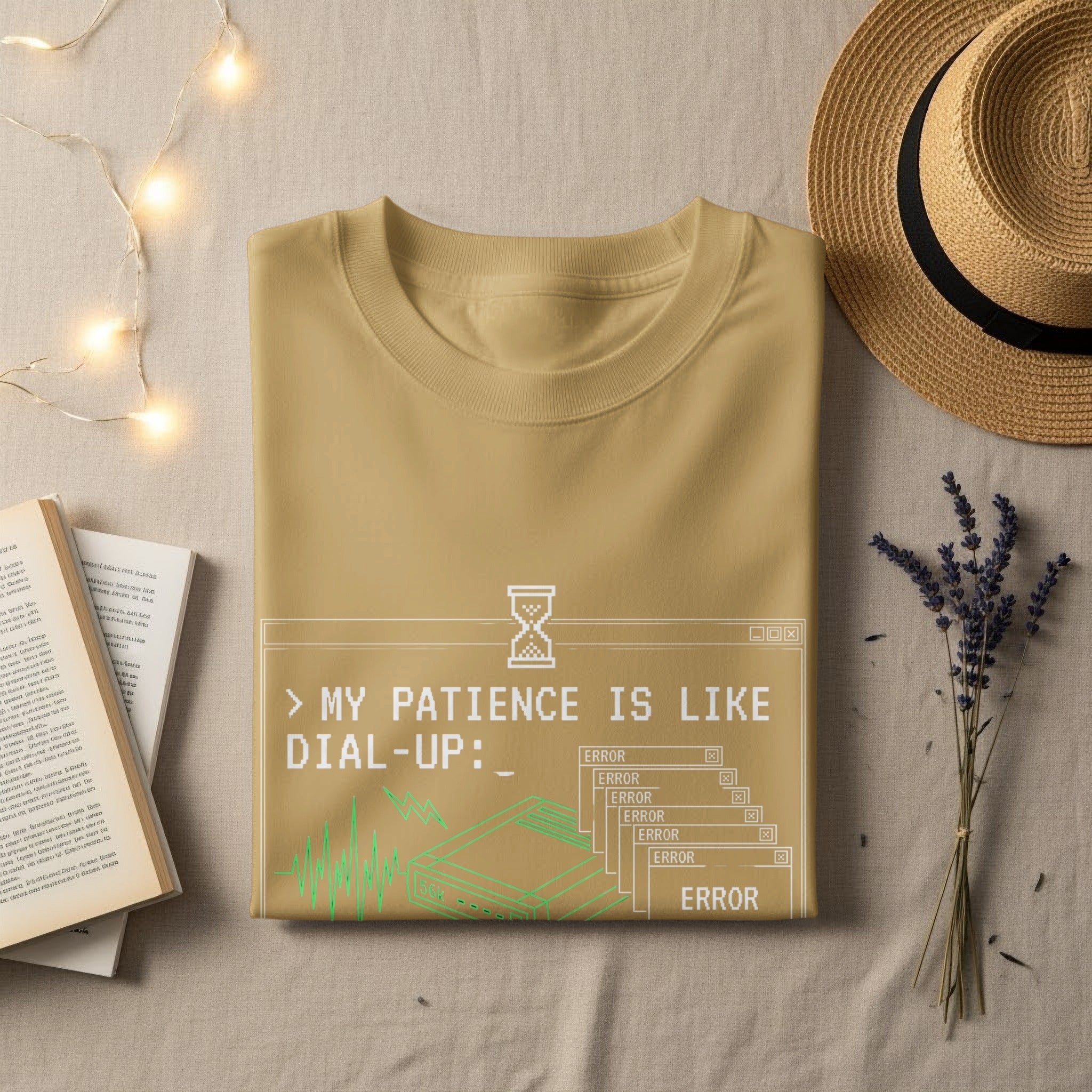 T-shirt with "My patience is like dial-up" and error messages.
