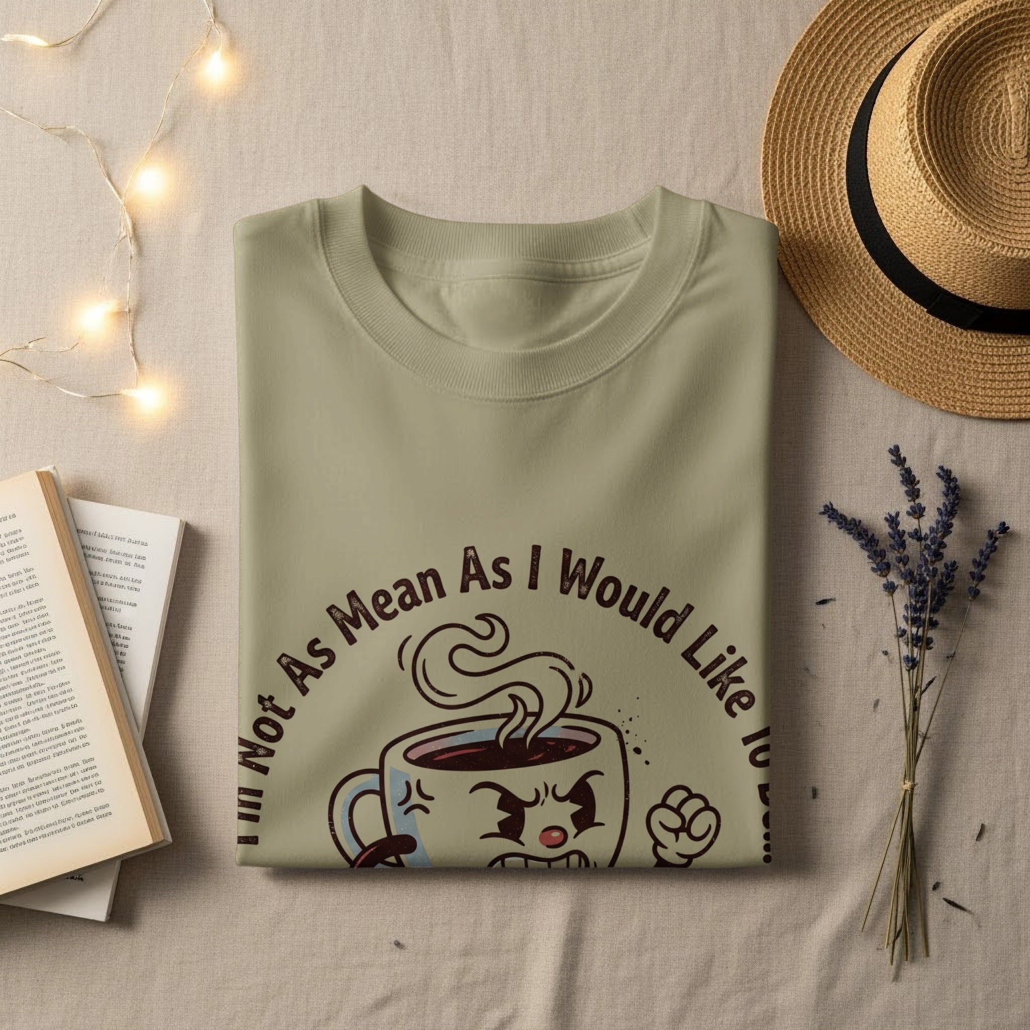 T-shirt with a cartoon coffee cup graphic and text "Not As Mean As I Would Like To".